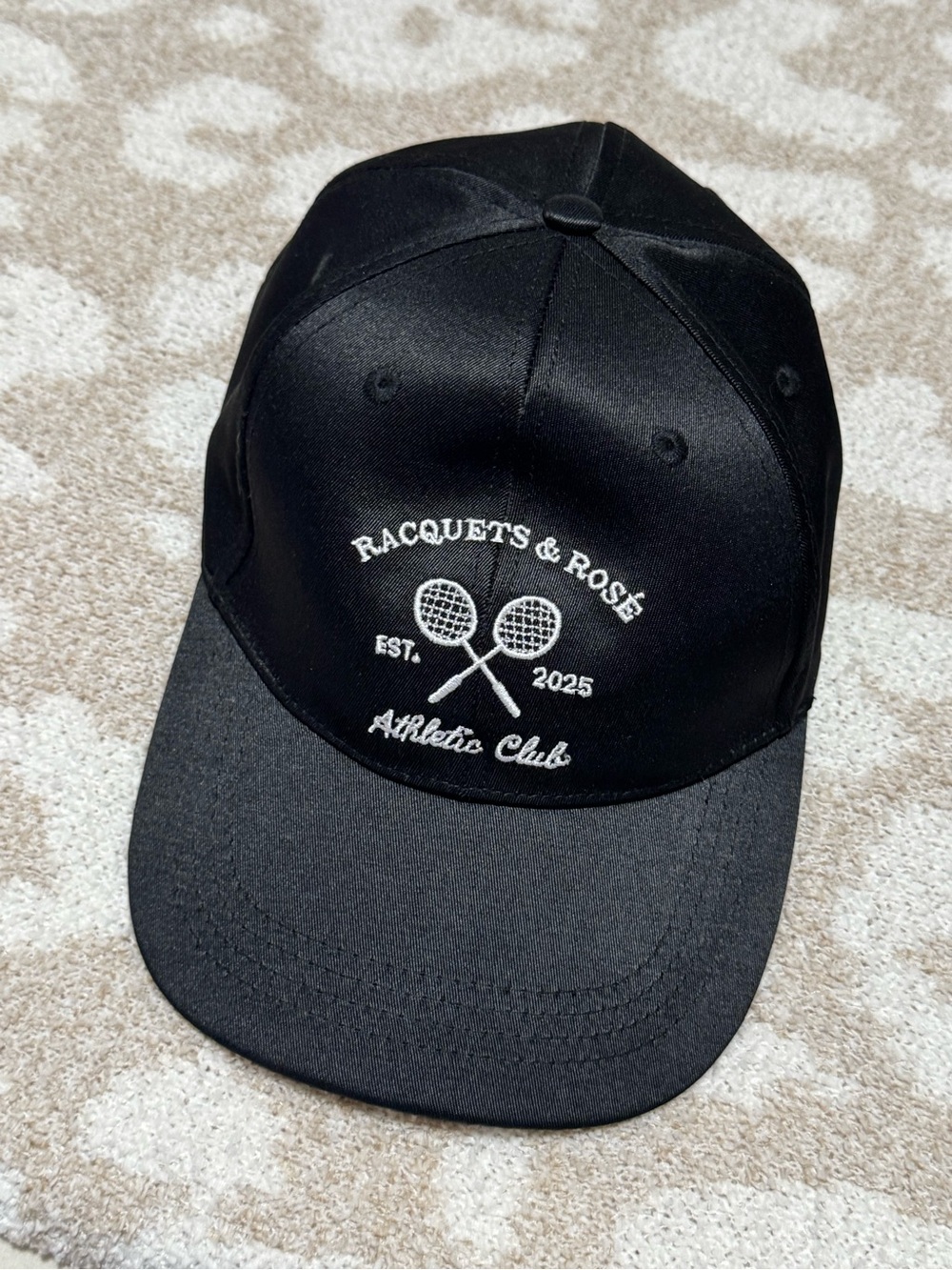 Racquets and roses baseball cap